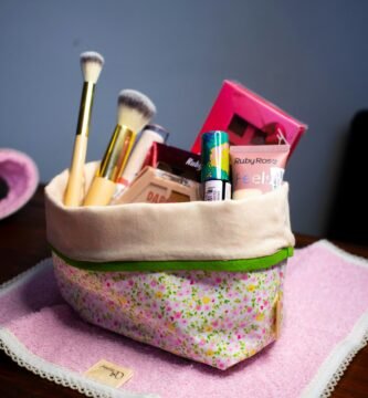 a purse with makeup and other items in it